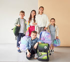 Children preparing for school with a school bag, illustrating tips on how to prepare children for school