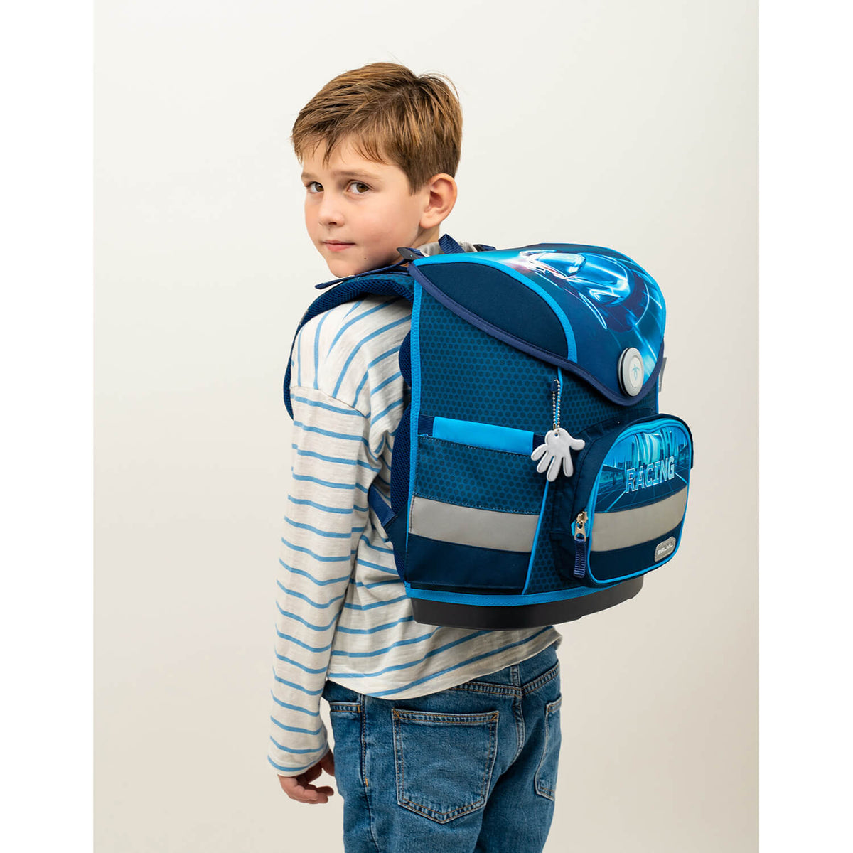 Side profile of the Ergonomic School Bag Set for Boys – Belmil Compact Racing Blue Neon schoolbag set 4 pcs emphasizing the adjustable straps.
