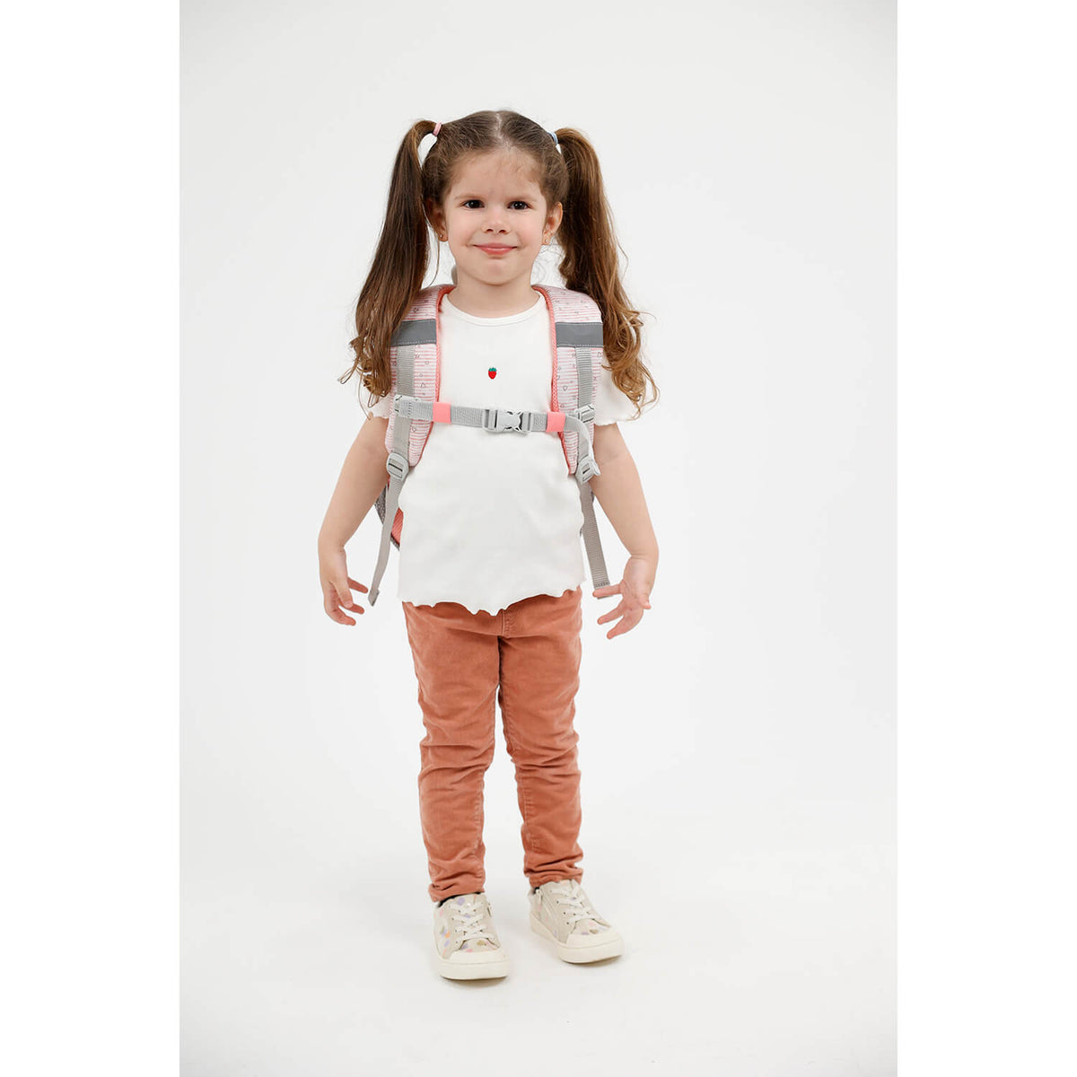 Close-up of the reflective elements on the Kiddy Plus Sweet Bunny Kindergarten Bag's straps and front pocket for added visibility.