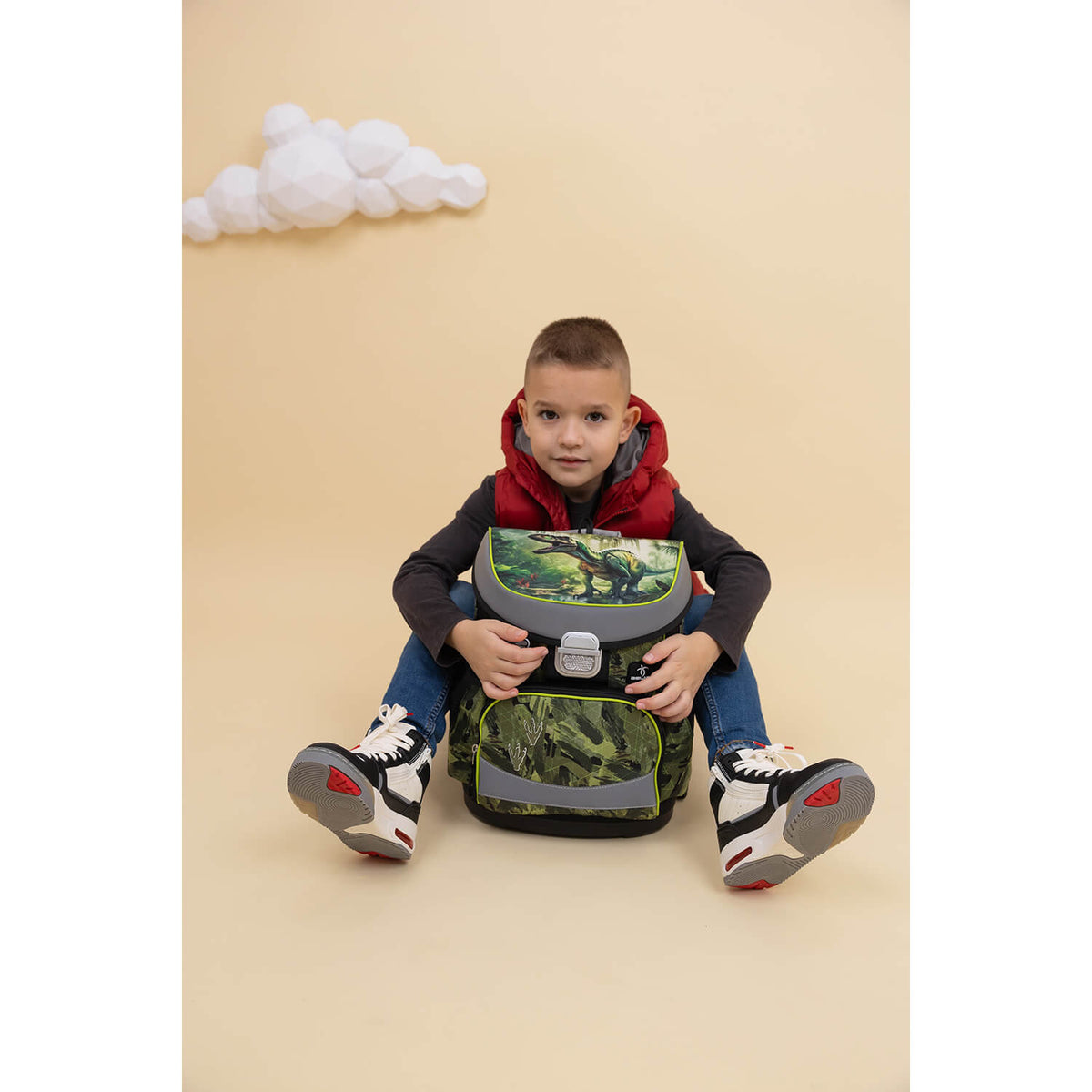 Detail view of the comfortable padded shoulder straps of the Belmil Mini-Fit Ergonomic School Bag Set for Boys “Lost World” Design + Dinosaur Raincoat – 5-Piece Compact and Back-Friendly School Starter Set.