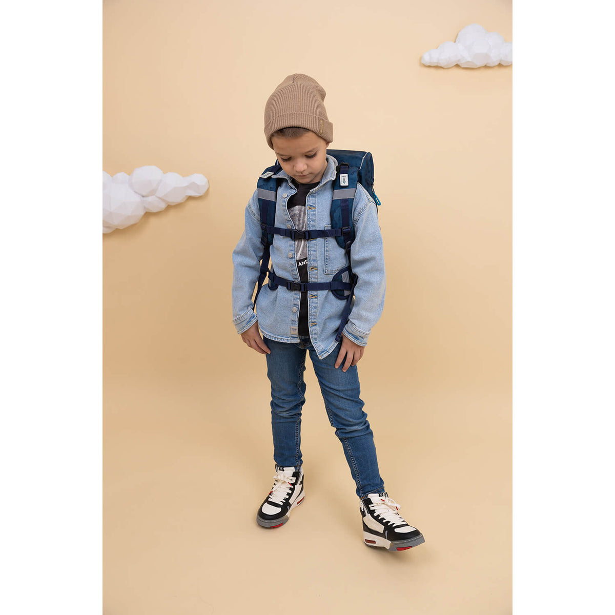 Lightweight Belmil Motion School Bag from recycled materials displayed in vibrant blue watercolor design.