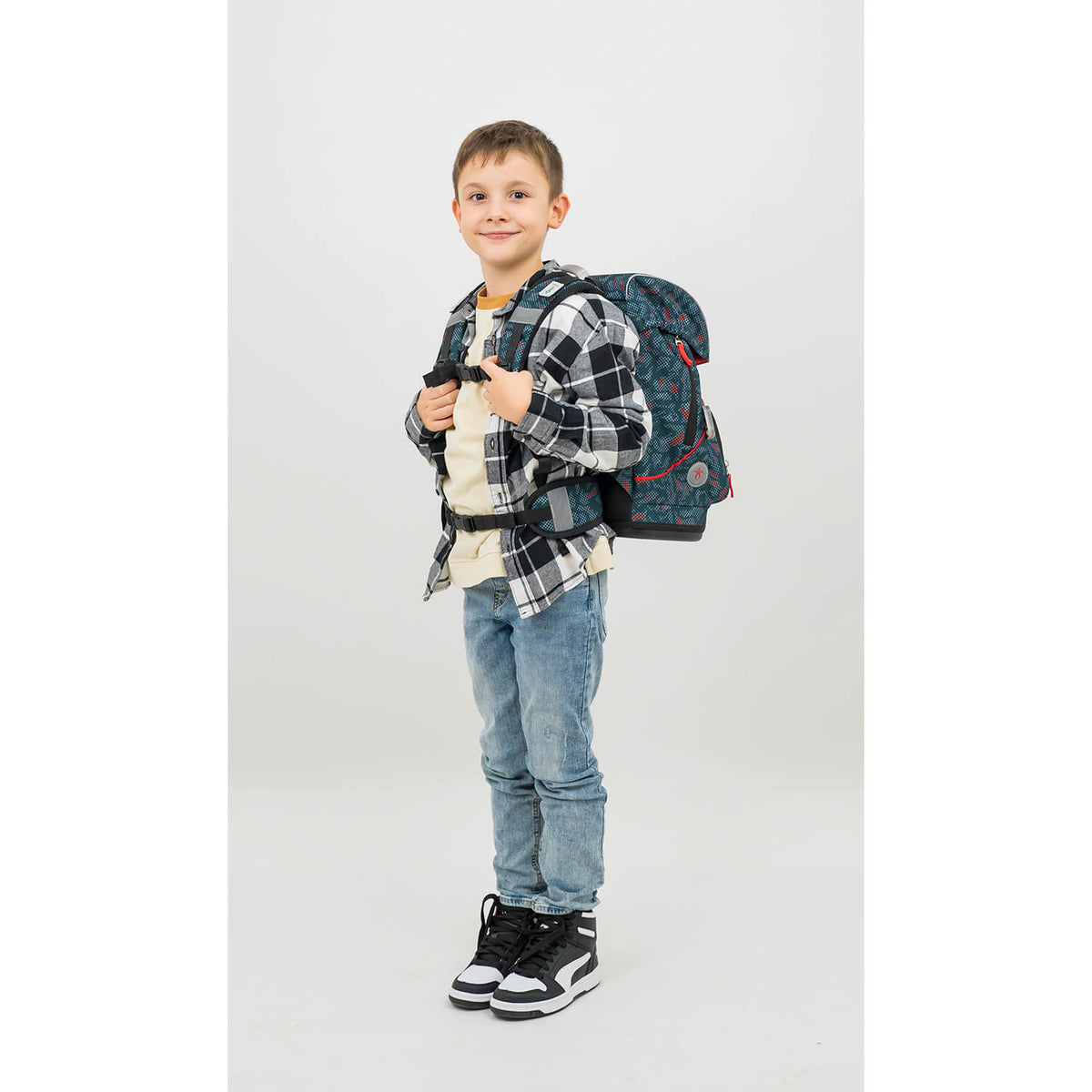 Close-up view of the Belmil Motion Red Dots School Bag featuring adjustable shoulder straps and a breathable padded back panel.